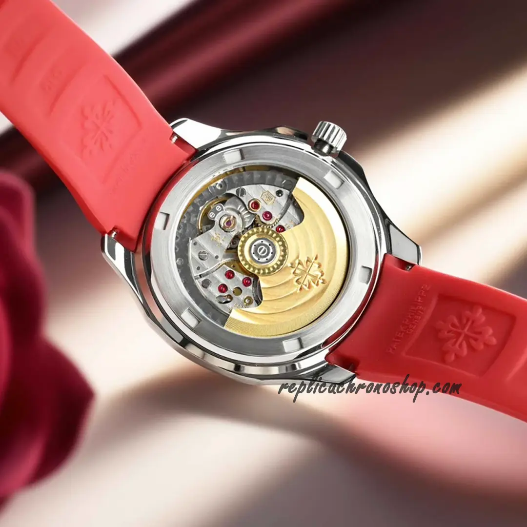 Caseback and strap view of Aquanaut-style {{主关键词: Replica Patek Philippe Aquanaut 5067A-027}} with red tropical rubber strap