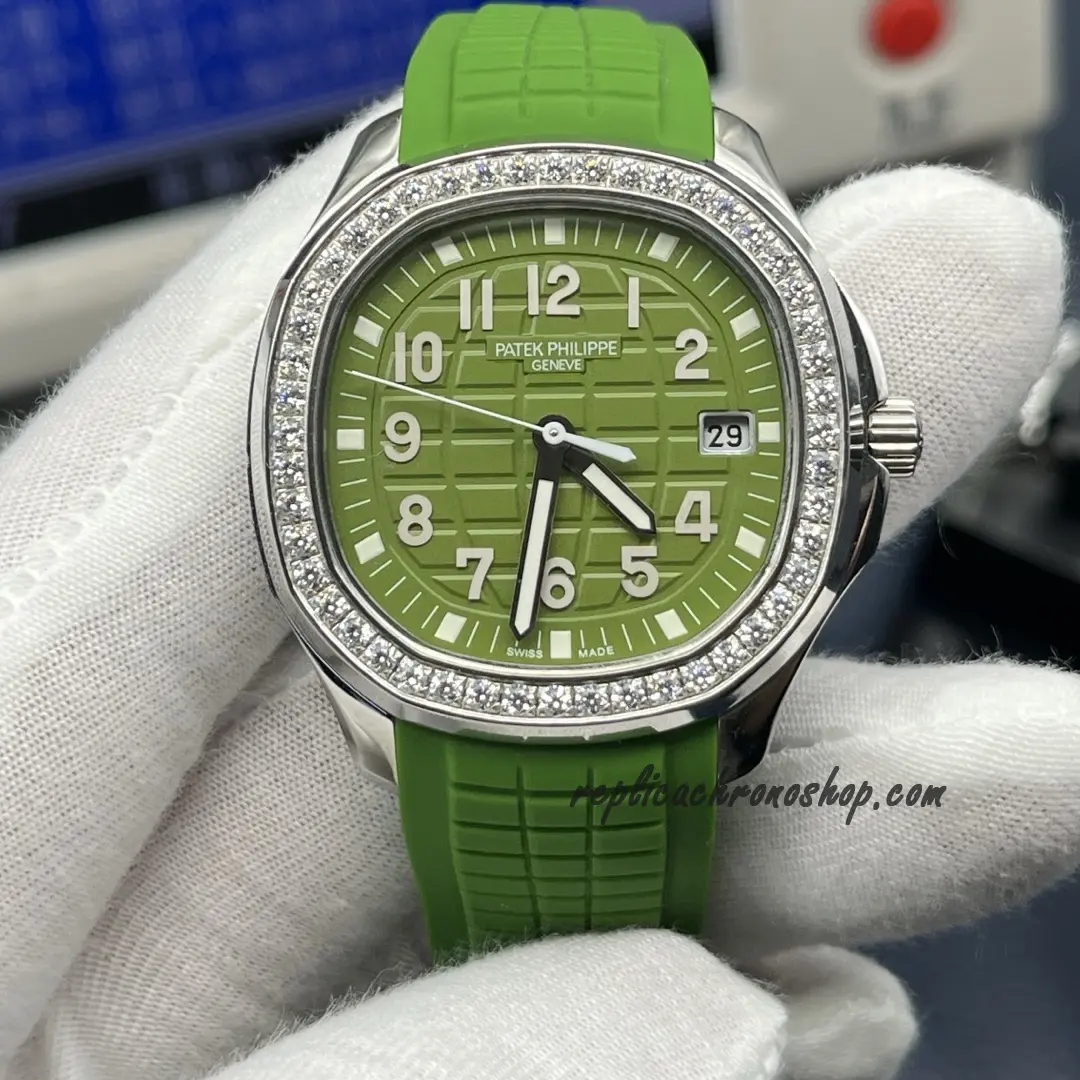 Front view of the Replica Patek Philippe Aquanaut 5267/200A-011 with green embossed dial and diamond bezel.