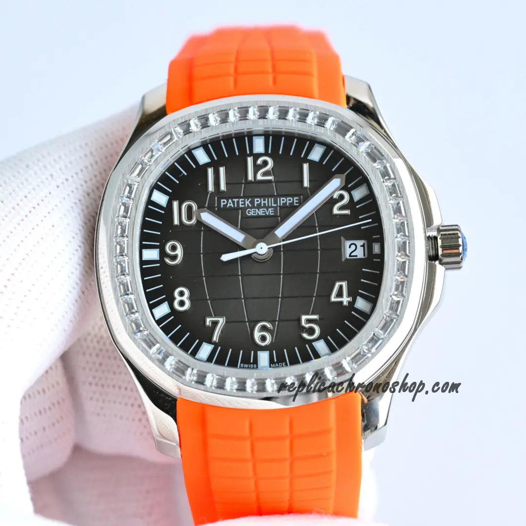 Front view of 40mm stainless-steel case with diamond bezel and orange rubber strap