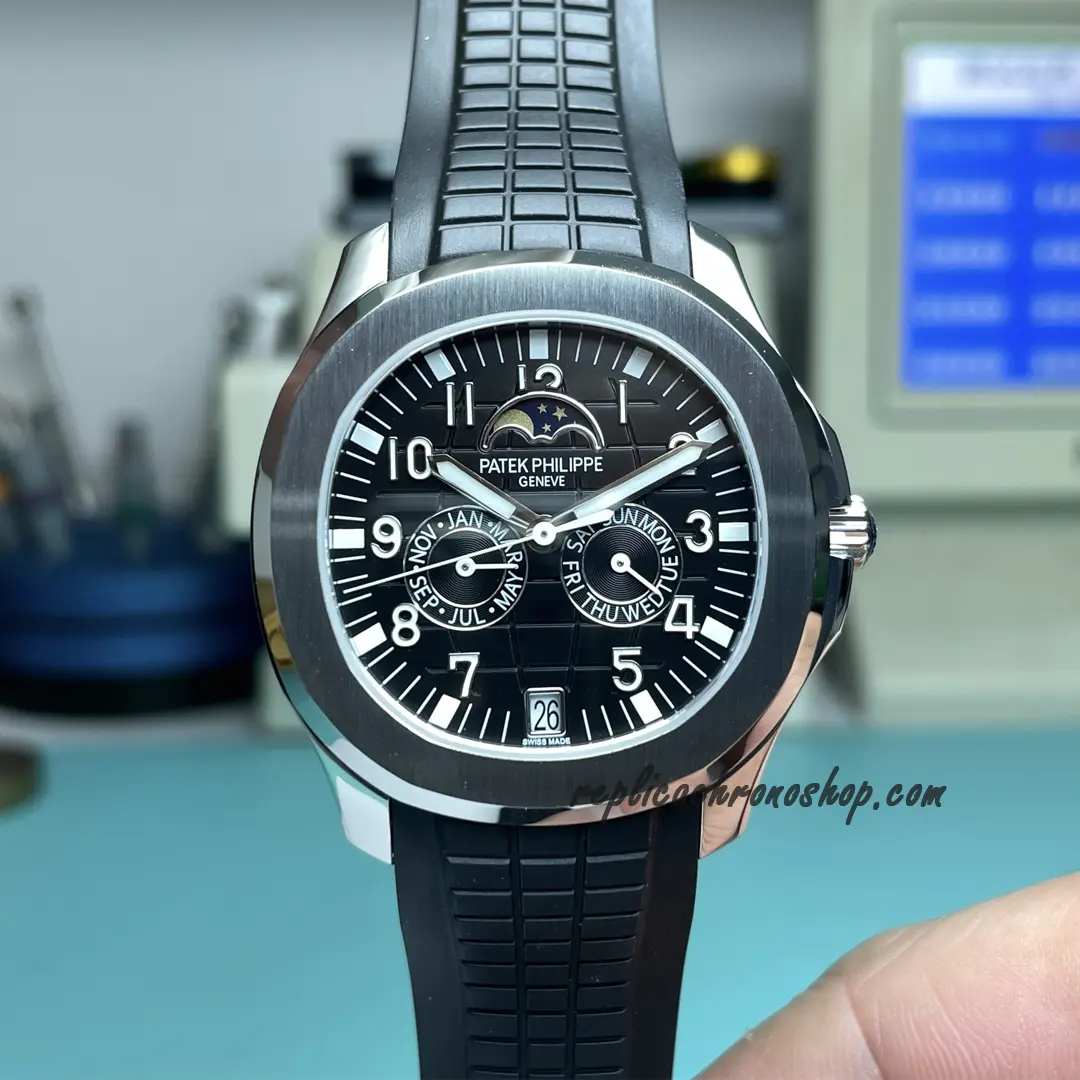 Front view of Aquanaut 5261R-001 style watch — rounded octagon case and black embossed dial