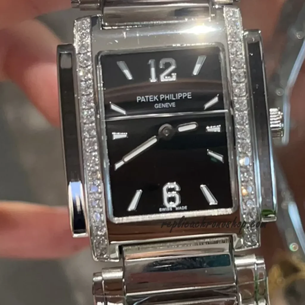 rectangular diamond bezel and black dial close-up
