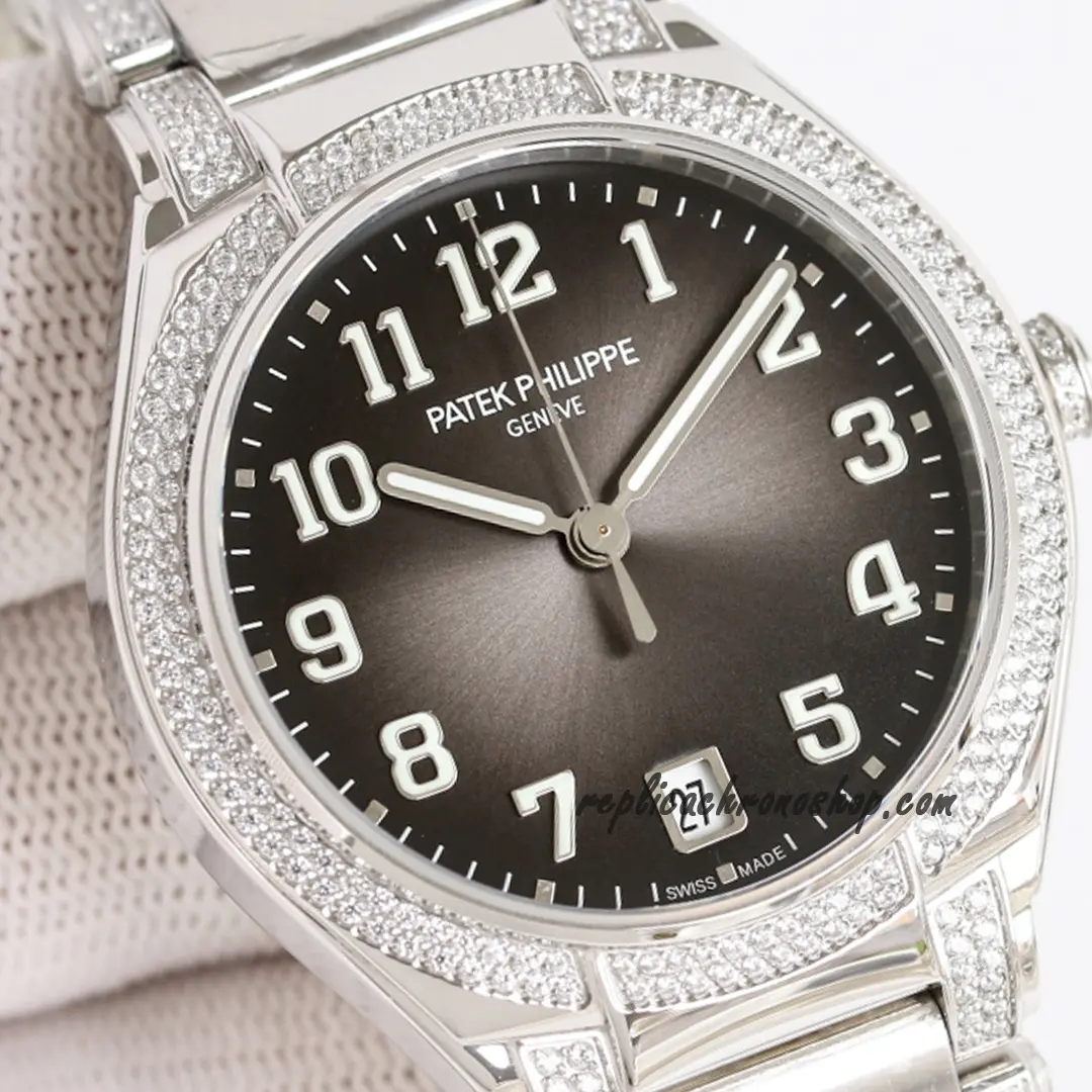 Detail of the brown sunburst dial and Arabic numerals on the Twenty-4 style ladies watch